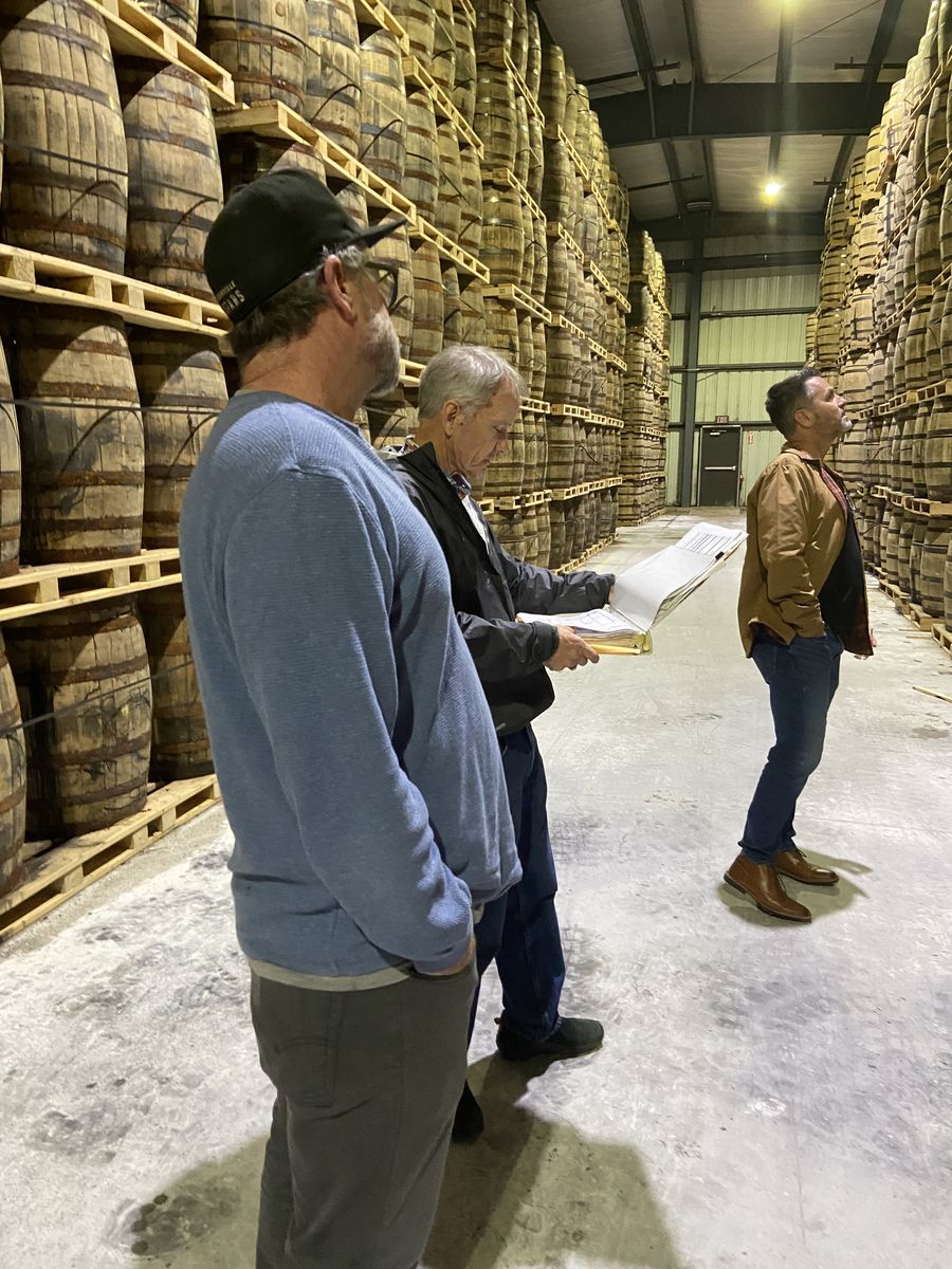 Experts selecting barrels and reviewing tasting notes