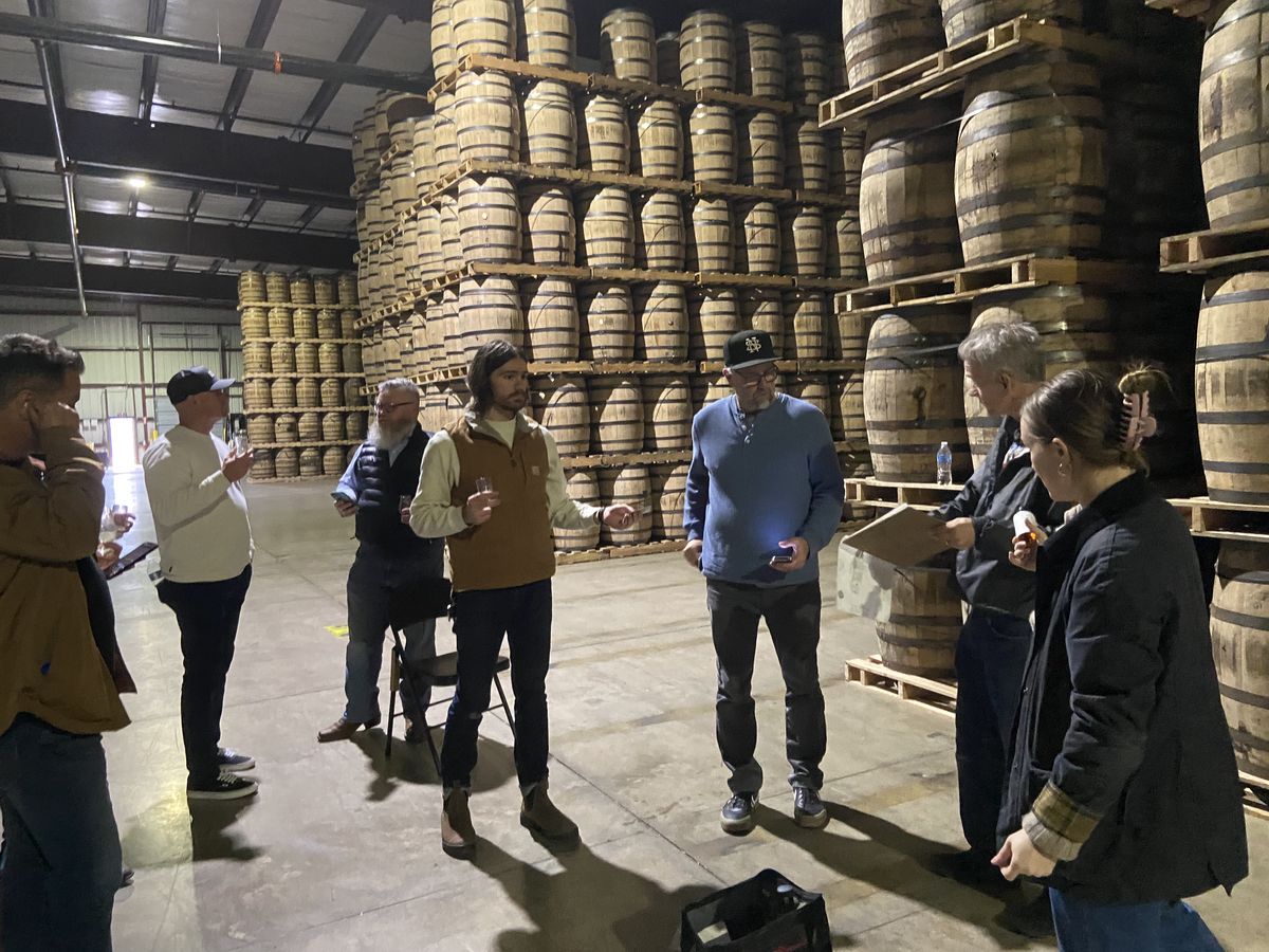 Group barrel tasting experience in the rickhouse